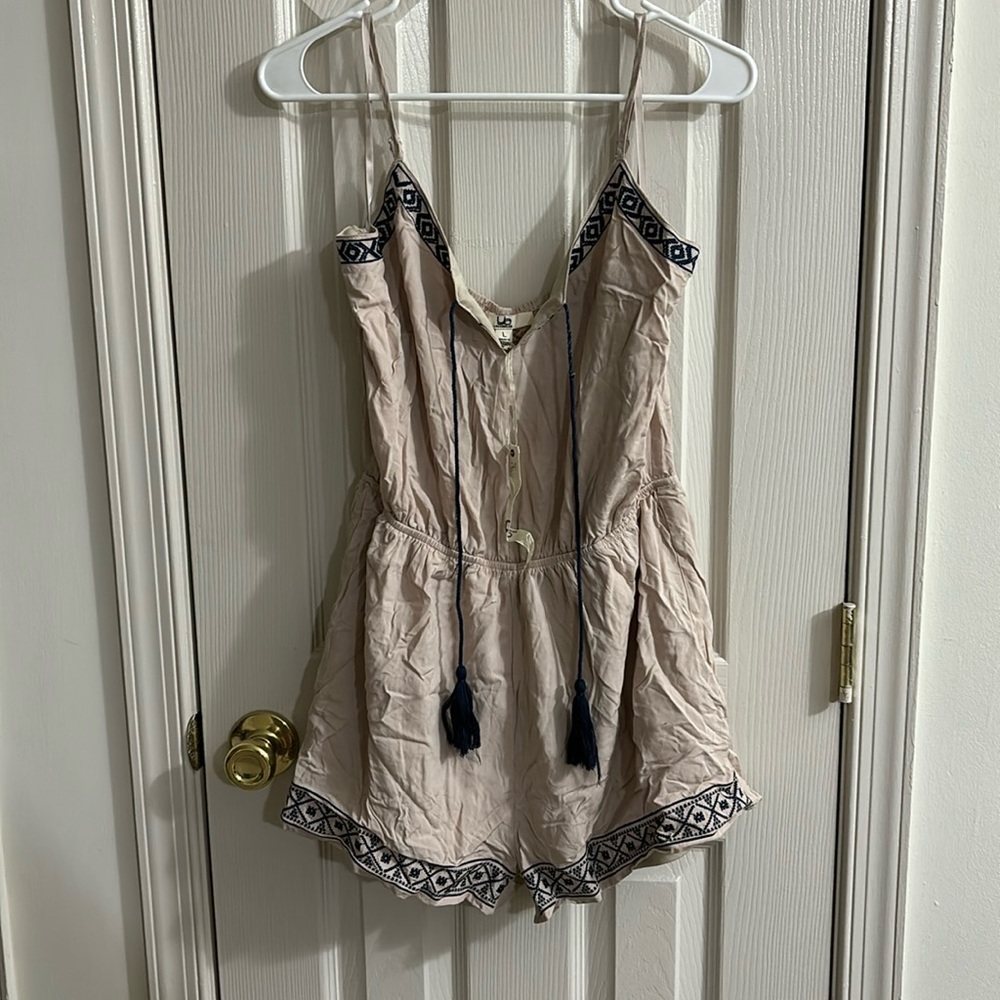 Tan and navy romper